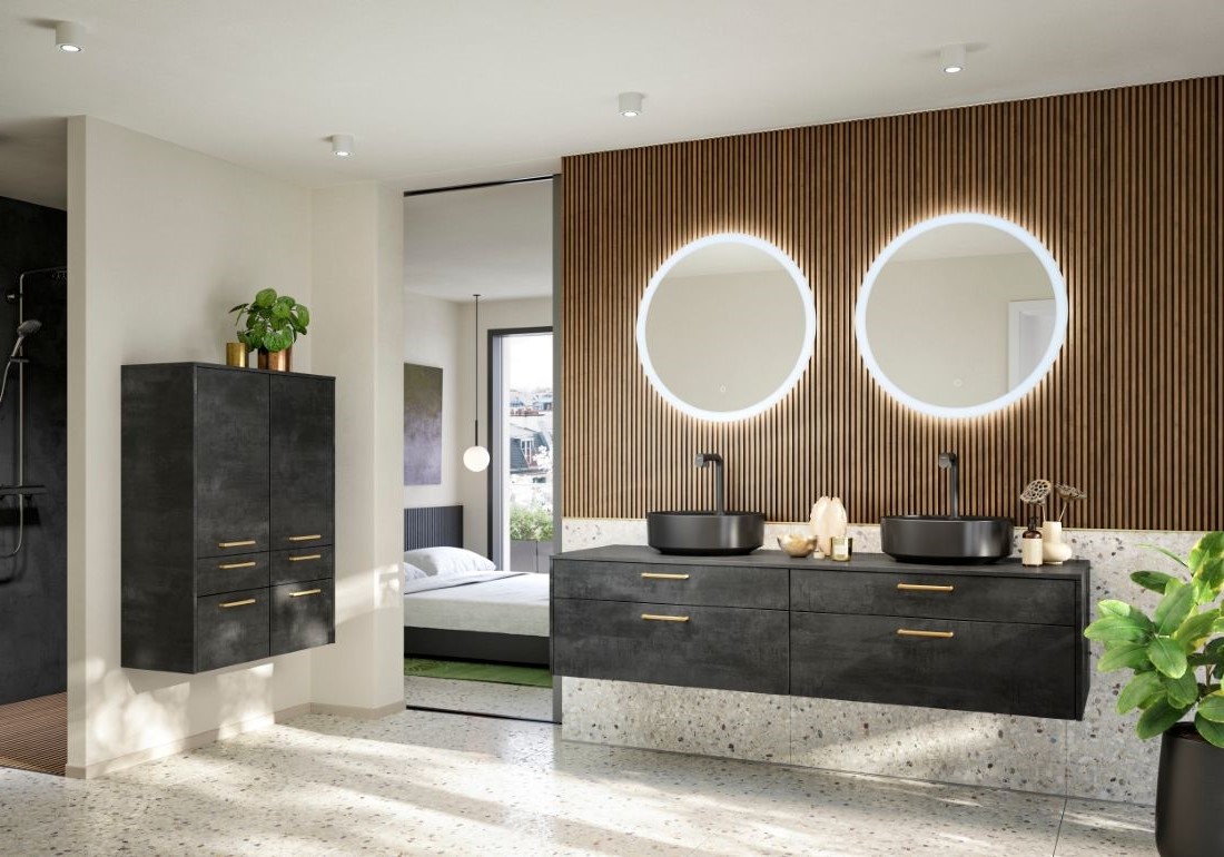 Modernes Badezimmer mit zwei runden beleuchteten Spiegeln und dunkelgrauer Waschtischplatte.
